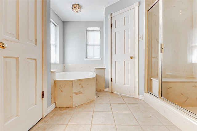 6225 Morton Rd, Katy, TX 77493 - bathroom featuring a bath, tile patterned floors, a marble finish shower, and crown molding