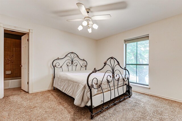 6225 Morton Rd, Katy, TX 77493 - carpeted bedroom featuring baseboards and a ceiling fan