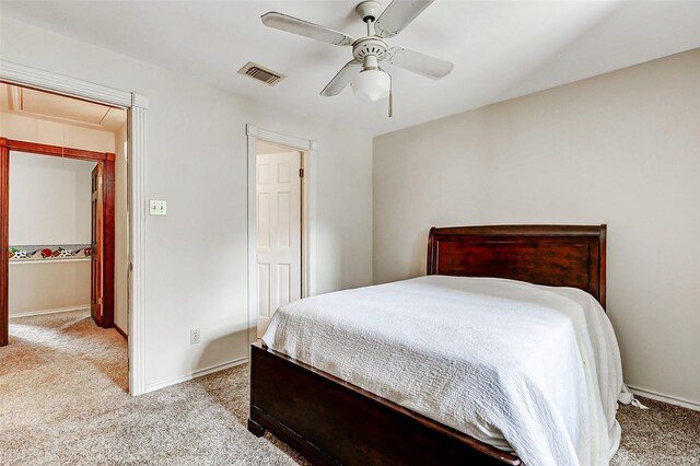 6225 Morton Rd, Katy, TX 77493 - carpeted bedroom with baseboards and ceiling fan