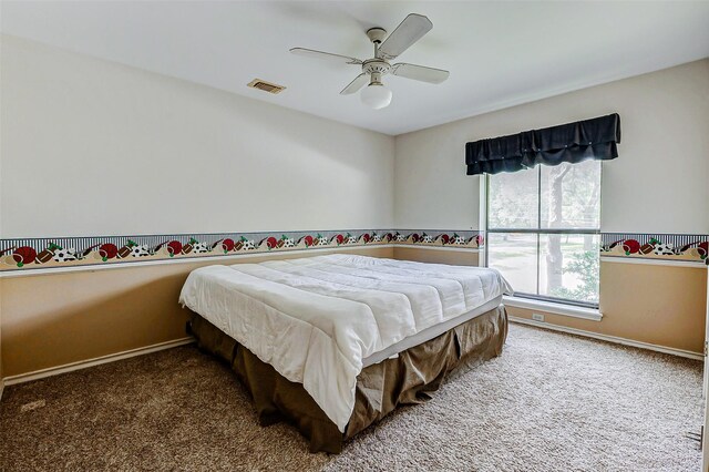6225 Morton Rd, Katy, TX 77493 - carpeted bedroom featuring baseboards and a ceiling fan