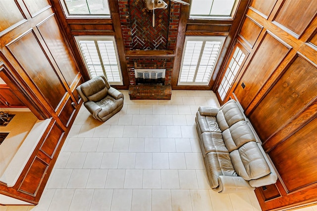 6225 Morton Rd, Katy, TX 77493 - tiled living room featuring a fireplace and healthy amount of natural light