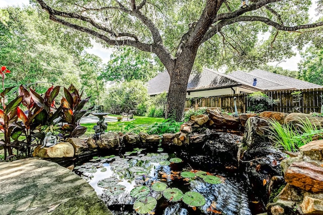 6225 Morton Rd, Katy, TX 77493 - view of yard with a garden pond