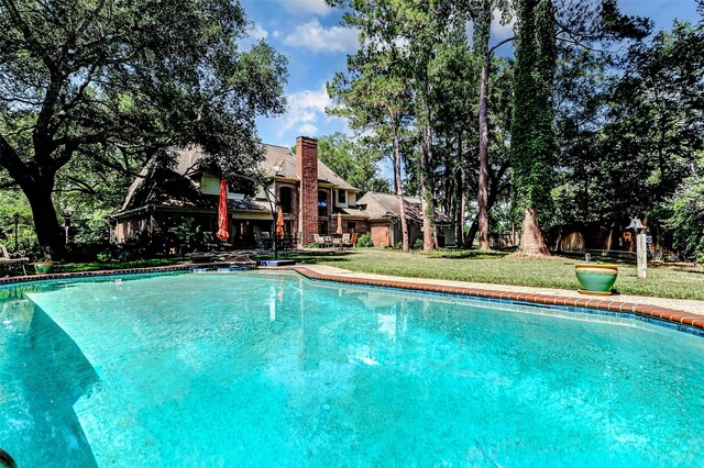 6225 Morton Rd, Katy, TX 77493 - outdoor pool featuring a lawn