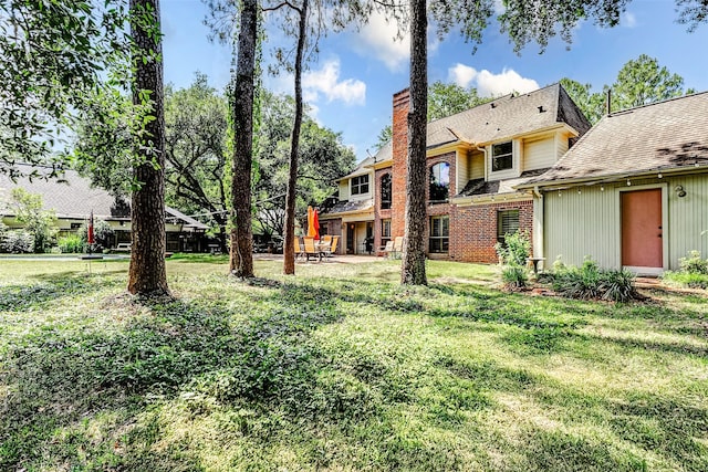 6225 Morton Rd, Katy, TX 77493 - view of green lawn with a patio area