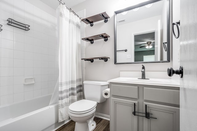 17307 Morning Star Ave, Crosby, TX 77532 - full bath featuring wood finished floors, vanity, toilet, shower / tub combo, and baseboards
