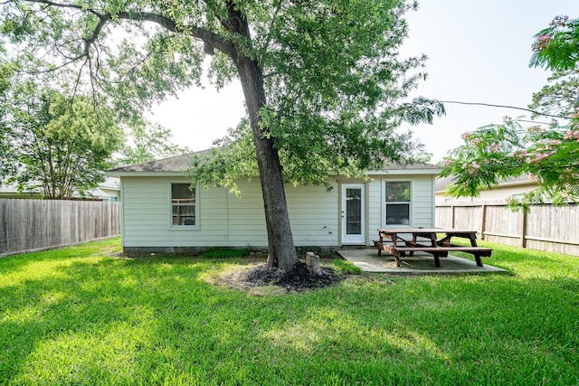 17307 Morning Star Ave, Crosby, TX 77532 - back of house featuring a patio area