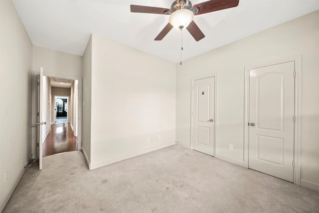 2718 Van Gogh Ln, Missouri City, TX 77459 - unfurnished bedroom with attic access, carpet flooring, baseboards, and a ceiling fan