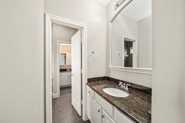 2718 Van Gogh Ln, Missouri City, TX 77459 - bathroom with tile patterned flooring and vanity