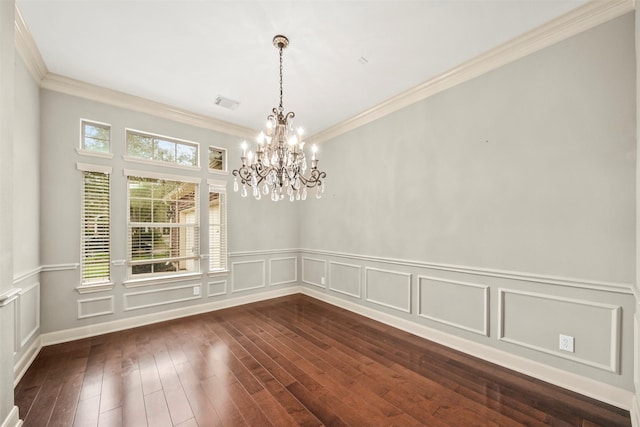 2718 Van Gogh Ln, Missouri City, TX 77459 - unfurnished dining area with a chandelier, ornamental molding, dark wood-style flooring, a decorative wall, and a wainscoted wall