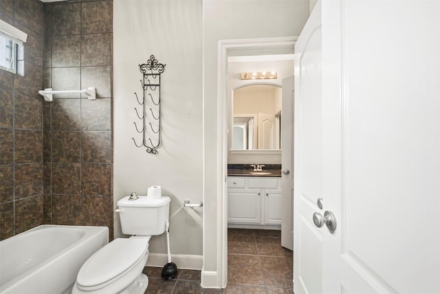 2718 Van Gogh Ln, Missouri City, TX 77459 - bathroom featuring toilet, vanity, tile patterned flooring, baseboards, and bathing tub / shower combination