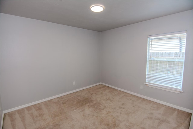 21734 Oriole Trl, Humble, TX 77338 - empty room with light colored carpet and baseboards