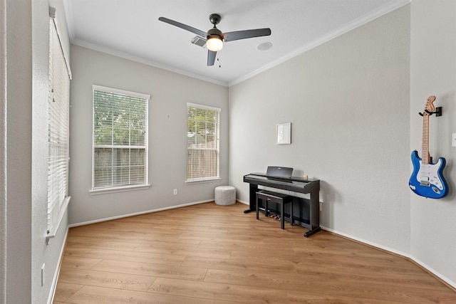6219 Royal Hollow Ln, Katy, TX 77450 - sitting room with crown molding, wood finished floors, ceiling fan, and baseboards