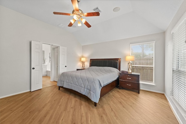 6219 Royal Hollow Ln, Katy, TX 77450 - bedroom with vaulted ceiling, light wood-type flooring, baseboards, and a ceiling fan