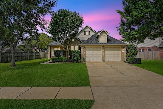 6219 Royal Hollow Ln, Katy, TX 77450 - view of front of home featuring driveway, brick siding, and a shingled roof
