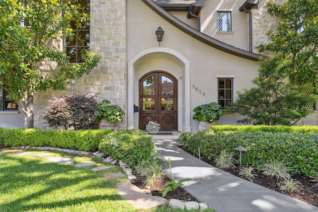 5626 Willers Way, Houston, TX 77056 - entrance to property with stucco siding, stone siding, and french doors