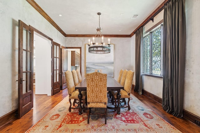 5626 Willers Way, Houston, TX 77056 - dining room featuring french doors, a chandelier, wood finished floors, crown molding, and baseboards