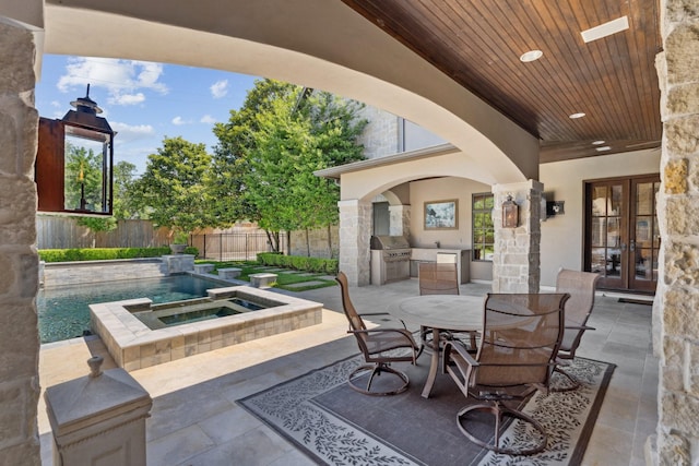 5626 Willers Way, Houston, TX 77056 - fenced backyard with french doors, a patio area, outdoor dining area, and a pool with connected hot tub