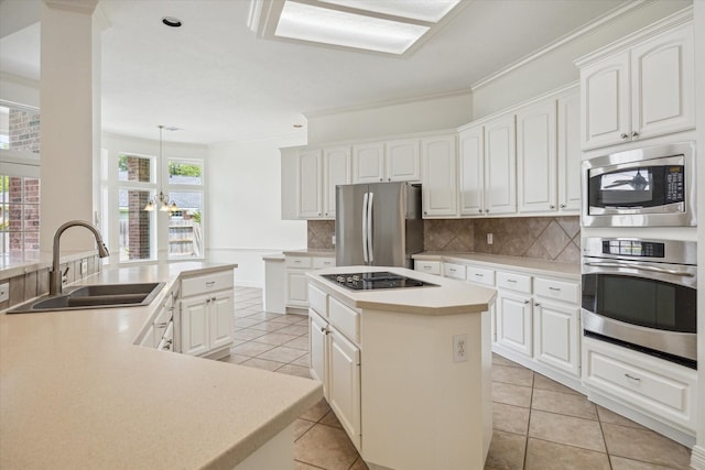 12210 Pebble Mdws, Houston, TX 77041 - kitchen featuring stainless steel appliances, a sink, a kitchen island, light tile patterned floors, and decorative backsplash