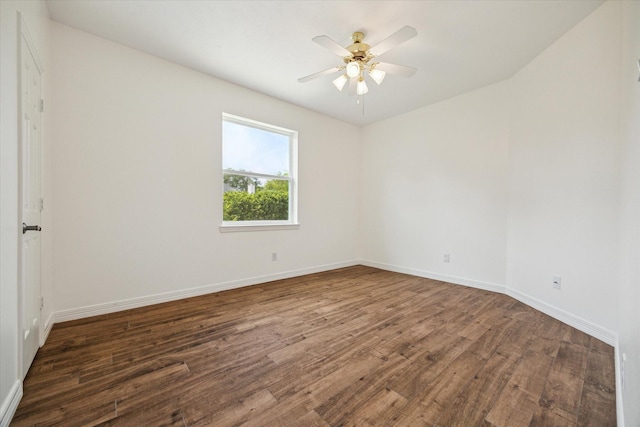 12210 Pebble Mdws, Houston, TX 77041 - unfurnished room with dark wood-type flooring, a ceiling fan, and baseboards
