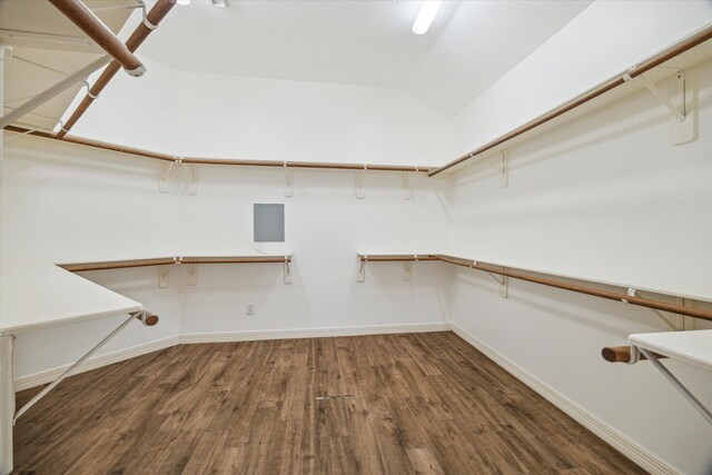 12210 Pebble Mdws, Houston, TX 77041 - walk in closet featuring wood finished floors and lofted ceiling