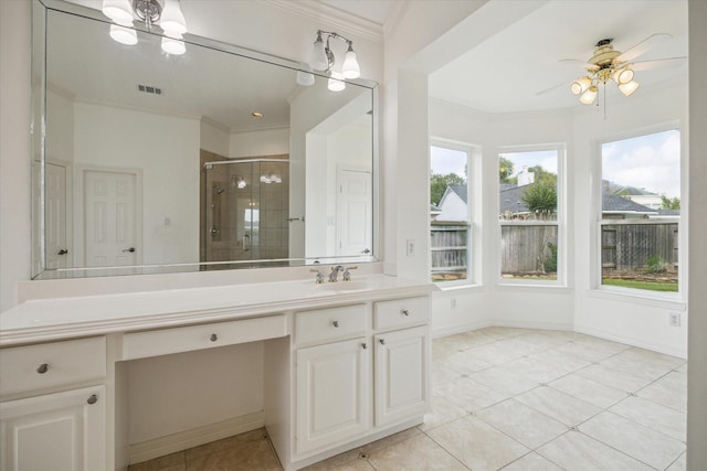 12210 Pebble Mdws, Houston, TX 77041 - bathroom with vanity, a shower stall, ornamental molding, tile patterned floors, and ceiling fan
