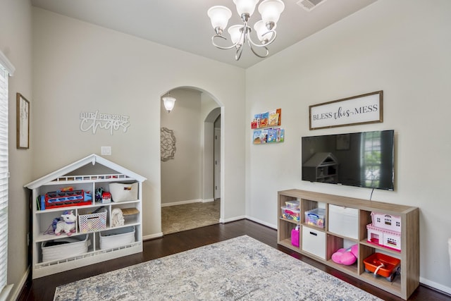 4410 Fenway Park Way, Spring, TX 77389 - recreation room featuring arched walkways, wood finished floors, a chandelier, and baseboards