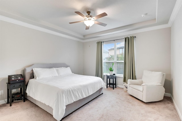 3413 Waverly Springs Ln, Pearland, TX 77581 - bedroom featuring a raised ceiling, light carpet, baseboards, and a ceiling fan
