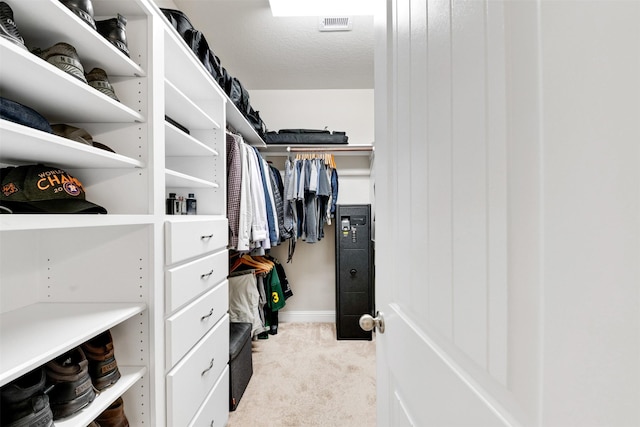 3413 Waverly Springs Ln, Pearland, TX 77581 - walk in closet featuring light carpet