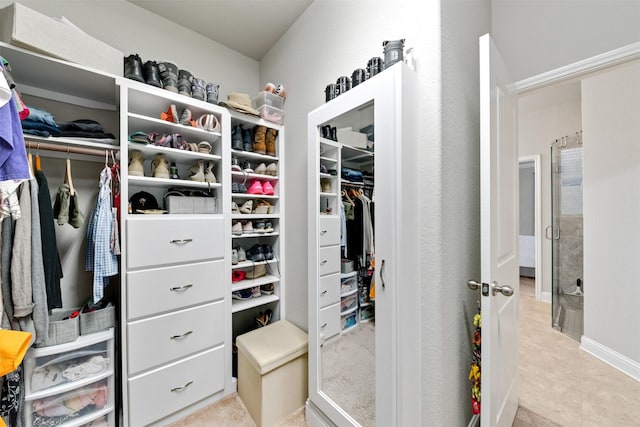 3413 Waverly Springs Ln, Pearland, TX 77581 - spacious closet with light tile patterned floors