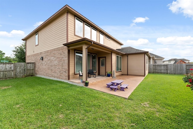 3413 Waverly Springs Ln, Pearland, TX 77581 - back of house with a patio area and brick siding