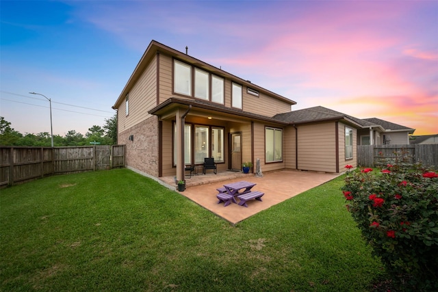 3413 Waverly Springs Ln, Pearland, TX 77581 - back of property with a patio area and brick siding