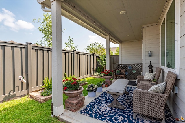 614 Seabreeze Dr, Kemah, TX 77565 - fenced backyard with an outdoor living space and a patio