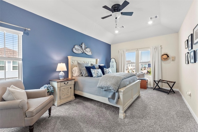 614 Seabreeze Dr, Kemah, TX 77565 - carpeted bedroom featuring multiple windows, baseboards, ceiling fan, and vaulted ceiling