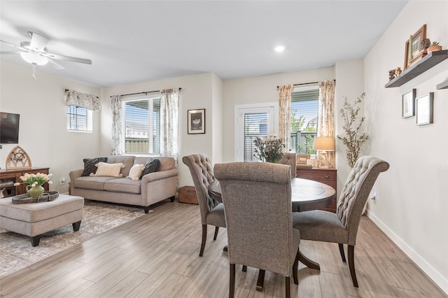 614 Seabreeze Dr, Kemah, TX 77565 - dining area with light wood-type flooring, plenty of natural light, ceiling fan, baseboards, and recessed lighting
