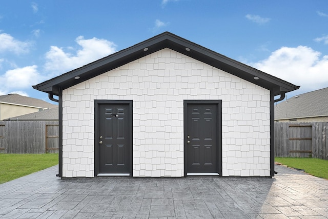 9506 Marble Park Ln, Baytown, TX 77521 - rear view of house featuring a fenced backyard, a patio area, and an outbuilding