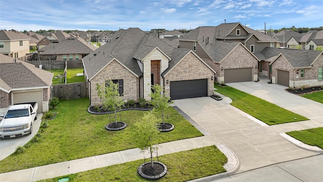 9506 Marble Park Ln, Baytown, TX 77521 - french provincial home featuring a residential view, brick siding, concrete driveway, a garage, and a shingled roof