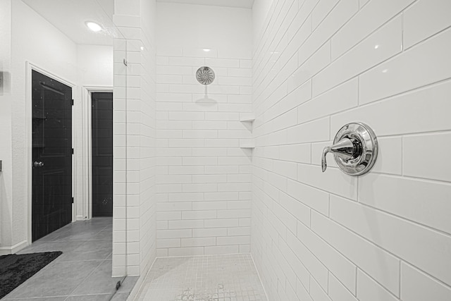 9506 Marble Park Ln, Baytown, TX 77521 - bathroom with a tile shower and tile patterned flooring
