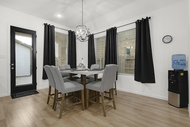 9506 Marble Park Ln, Baytown, TX 77521 - dining room with a chandelier, baseboards, light wood-type flooring, and recessed lighting