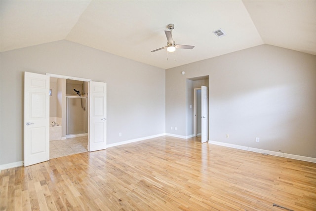 1811 Senca Springs Ct, Katy, TX 77450 - empty room featuring lofted ceiling, ceiling fan, light wood-style floors, and baseboards