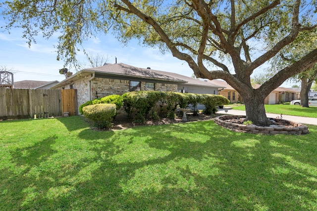 2413 38th Ave N, Texas City, TX 77590 - view of side of property featuring an attached garage