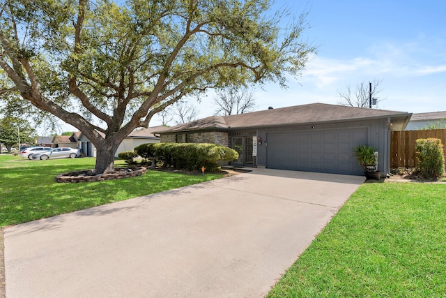 2413 38th Ave N, Texas City, TX 77590 - ranch-style home featuring an attached garage and concrete driveway