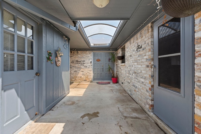 2413 38th Ave N, Texas City, TX 77590 - view of exterior entry featuring brick siding