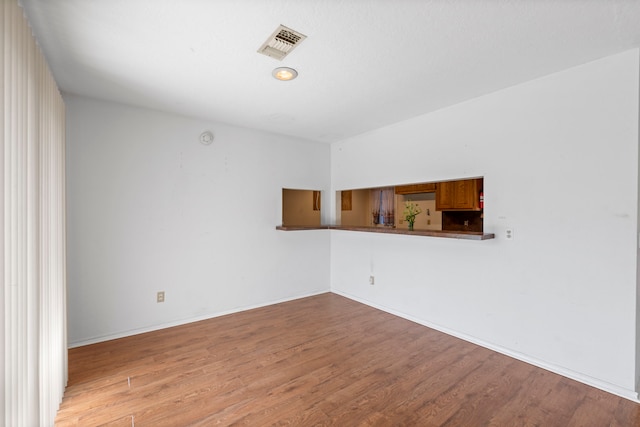 2413 38th Ave N, Texas City, TX 77590 - spare room featuring wood finished floors and baseboards