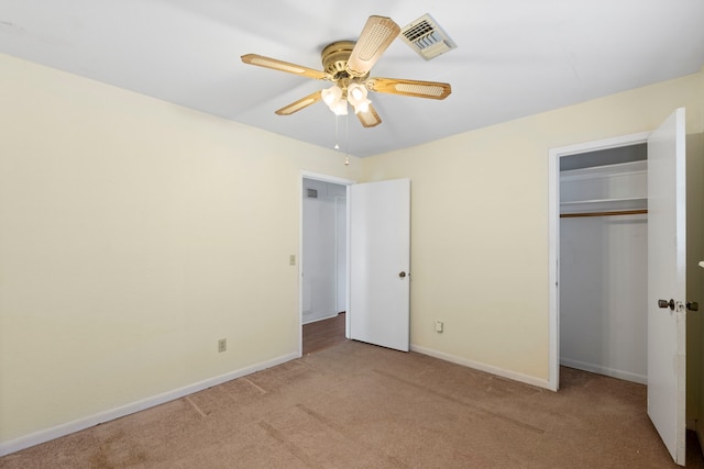 2413 38th Ave N, Texas City, TX 77590 - unfurnished bedroom featuring carpet floors, baseboards, a closet, and ceiling fan