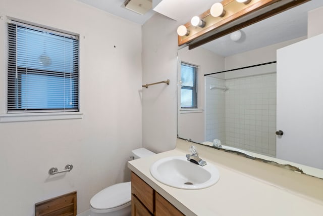 2413 38th Ave N, Texas City, TX 77590 - full bathroom featuring toilet, vanity, and a shower