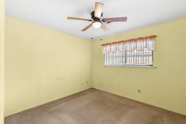 2413 38th Ave N, Texas City, TX 77590 - carpeted spare room featuring a ceiling fan and baseboards
