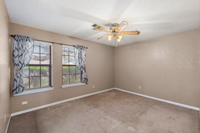 2413 38th Ave N, Texas City, TX 77590 - spare room with carpet flooring, ceiling fan, and baseboards