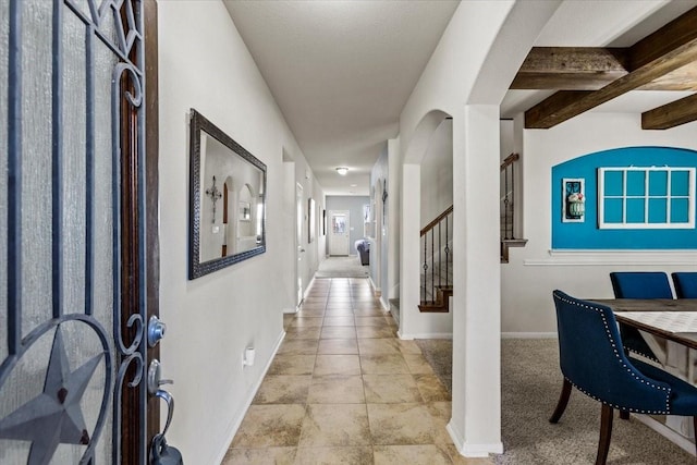2506 Solitude, Deer Park, TX 77536 - hallway featuring baseboards, stairs, and beamed ceiling