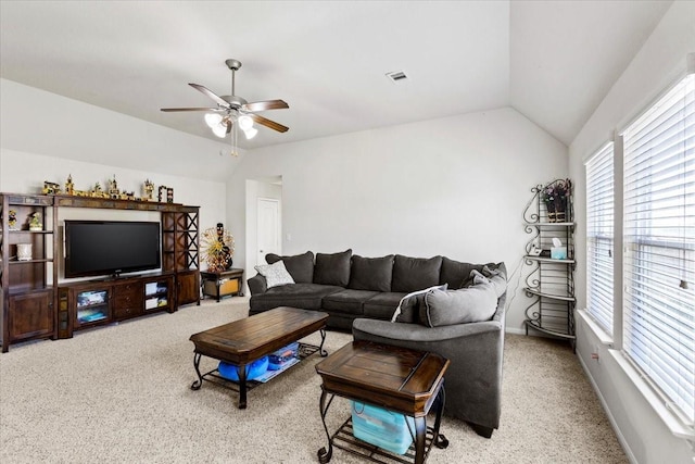 2506 Solitude, Deer Park, TX 77536 - carpeted living area with vaulted ceiling, healthy amount of natural light, a ceiling fan, and baseboards