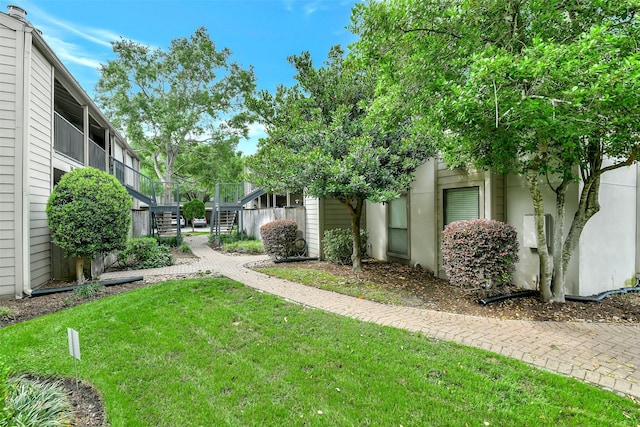1100 Augusta Dr Unit 33, Houston, TX 77057 - view of green lawn featuring stairs